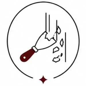 Line drawing of a hand with a red-handled tool breaking a glass pane into shards inside a circular border.